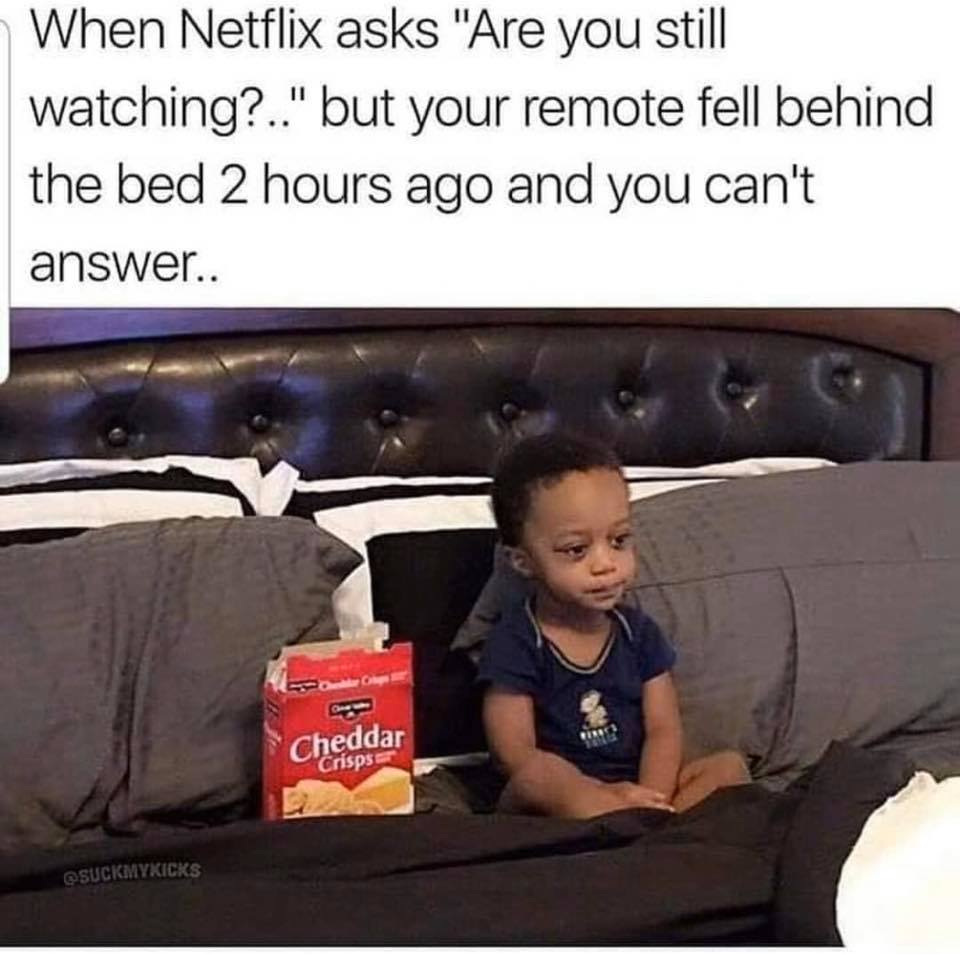 little boy on bed eating crackers meme - When Netflix asks "Are you still watching?.." but your remote fell behind the bed 2 hours ago and you can't answer.. Cheddar Suckmykicks