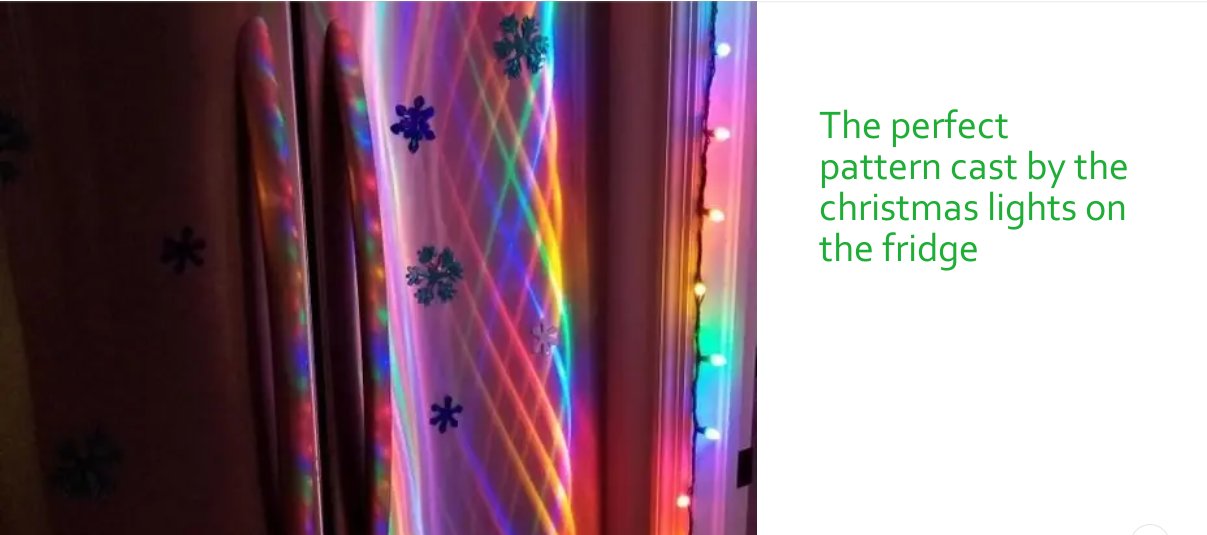 christmas light reflection - The perfect pattern cast by the christmas lights on the fridge