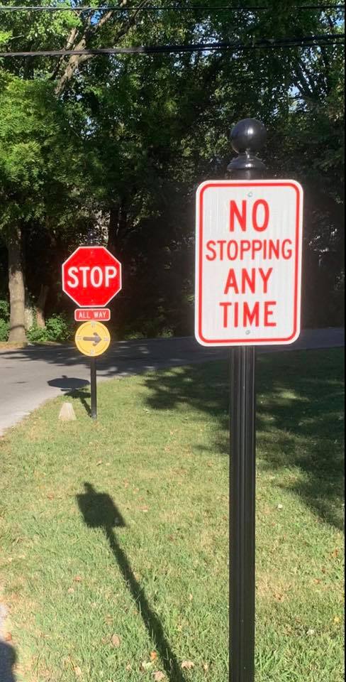 street sign - Stop No Stopping Any Time All Way