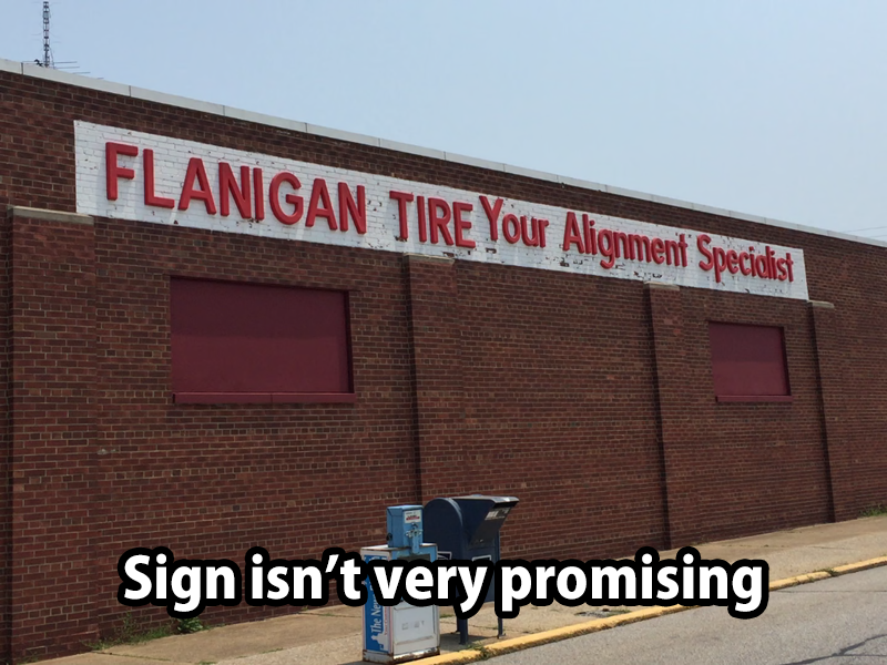 acdc albums - | Flanigan Tire Your Alignment Specialist Sign isn't very promising