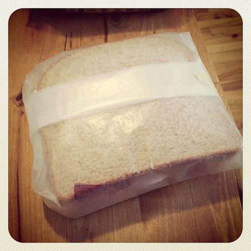 sandwich wrapped in wax paper
