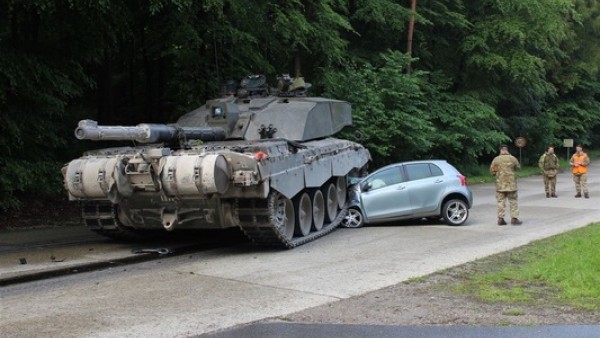 tank running over car