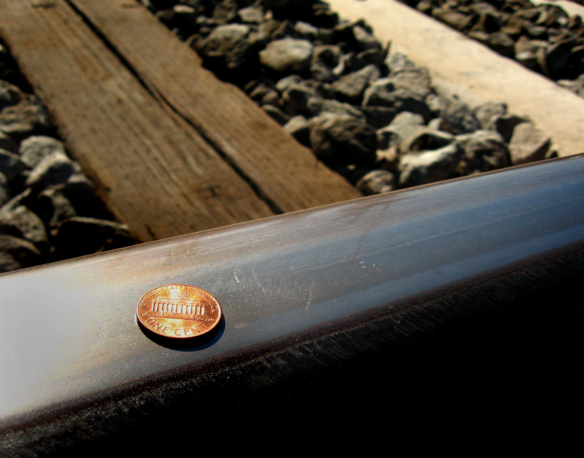 pennies on a railroad track