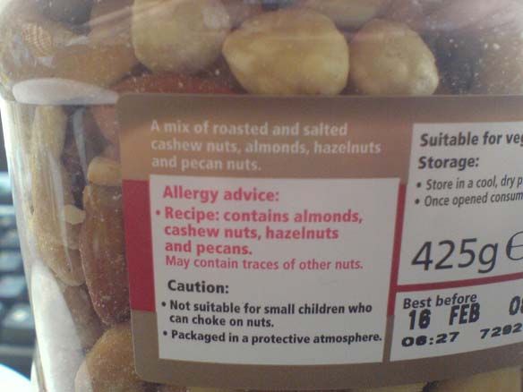 warning may contain nuts funny - A mix of roasted and salted cashew nuts, almonds, hazelnuts and pecan nuts Allergy advice Recipe contains almonds, cashew nuts, hazelnuts Suitable for ve Storage Store in a cool, dryp Once opened consum and pecans. 425g Ma