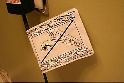 dumb warning labels - je contact warning for straightening iron In Canada Not for household use Caution This Product Can Burn Eyes Er Greece Product Peut Occasonerdes Piless Lonelx