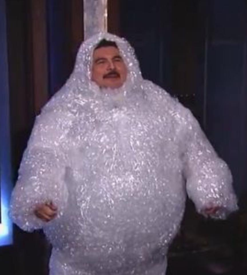 man wrapped in bubble wrap