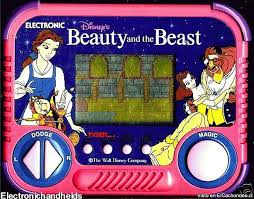beauty and the beast hand held game - Electronic Die Beautyand the Beast Dodge Tige Magic Ot Watc Electronichandhelds Yadd