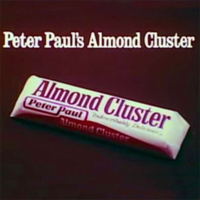 It consisted of diced almonds and coconut covered with dark chocolate, becoming the forerunner of the Almond Joy bar.