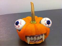 halloween pumpkin carving - funny eyeballs teeth fangs