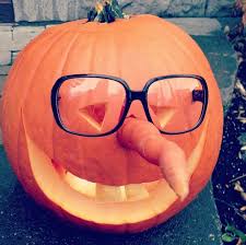 halloween pumpkin carving - carrot nose big glasses
