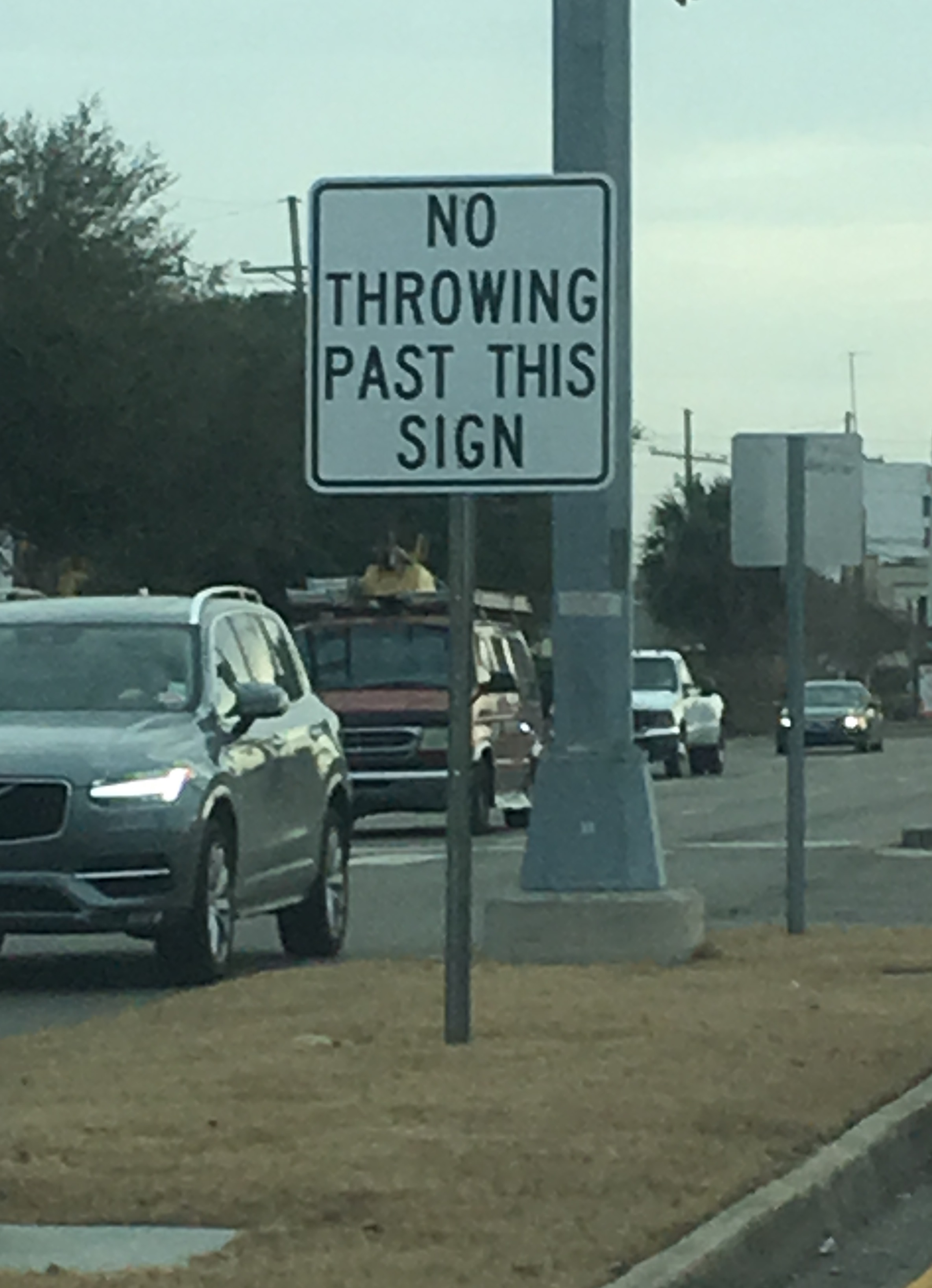 bad sign - No Throwing Past This Sign