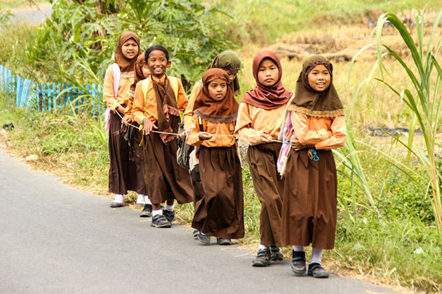 Indonesian kids walk to school