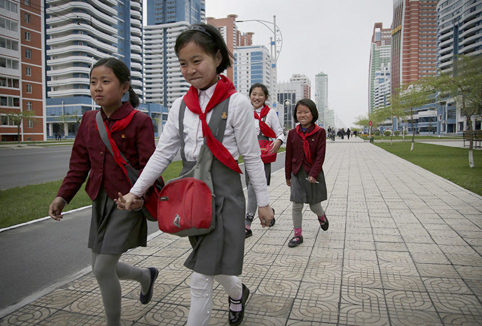 Girls walking to school in North Korea