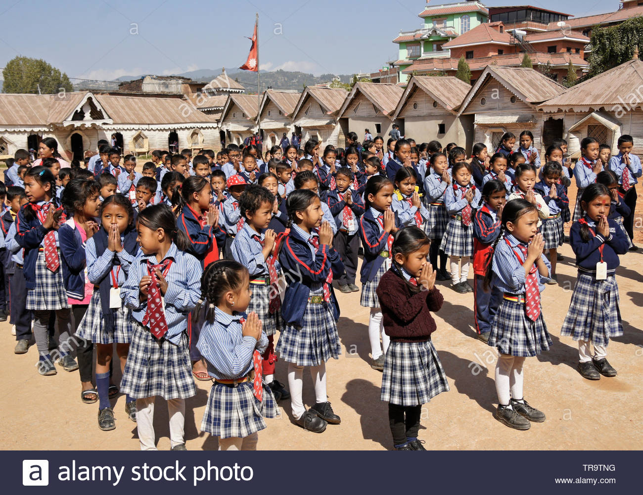 Nepal kids line up in the yard