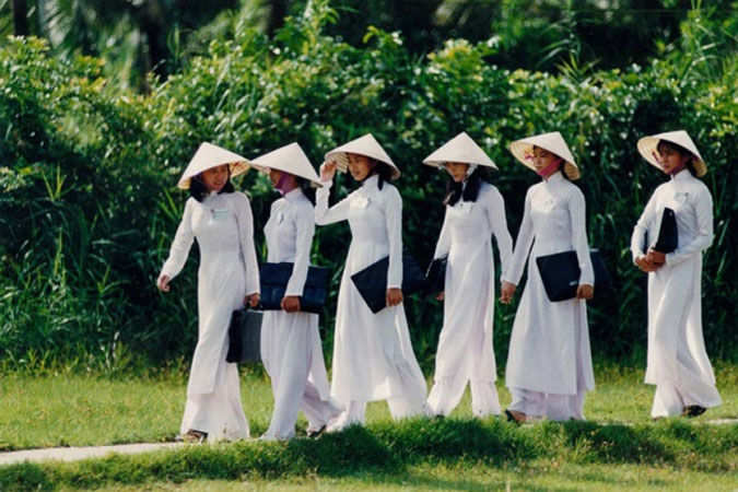 High school girls in Vietnam in their traditional uniforms