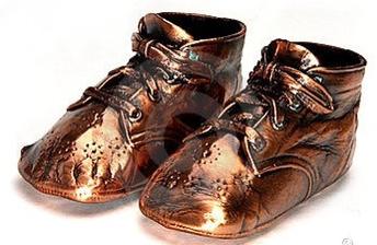 I don't know why they had metal baby shoes but it was a thing and everyone seemed to have them