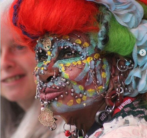 And this woman holds the record for most piercings on a woman