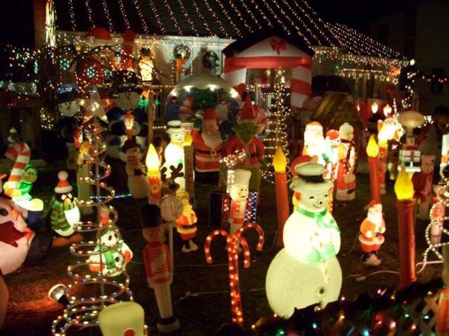 These country folk just mixed 1950s decorations with religious and inflatables- it's like ADHD Christmas decorating