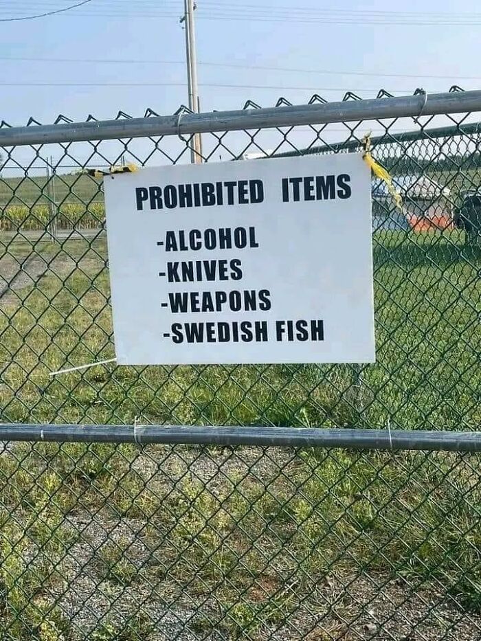 signs you need a new sign - fence - Xi Prohibited Items Alcohol Knives aus Weapons Swedish Fish
