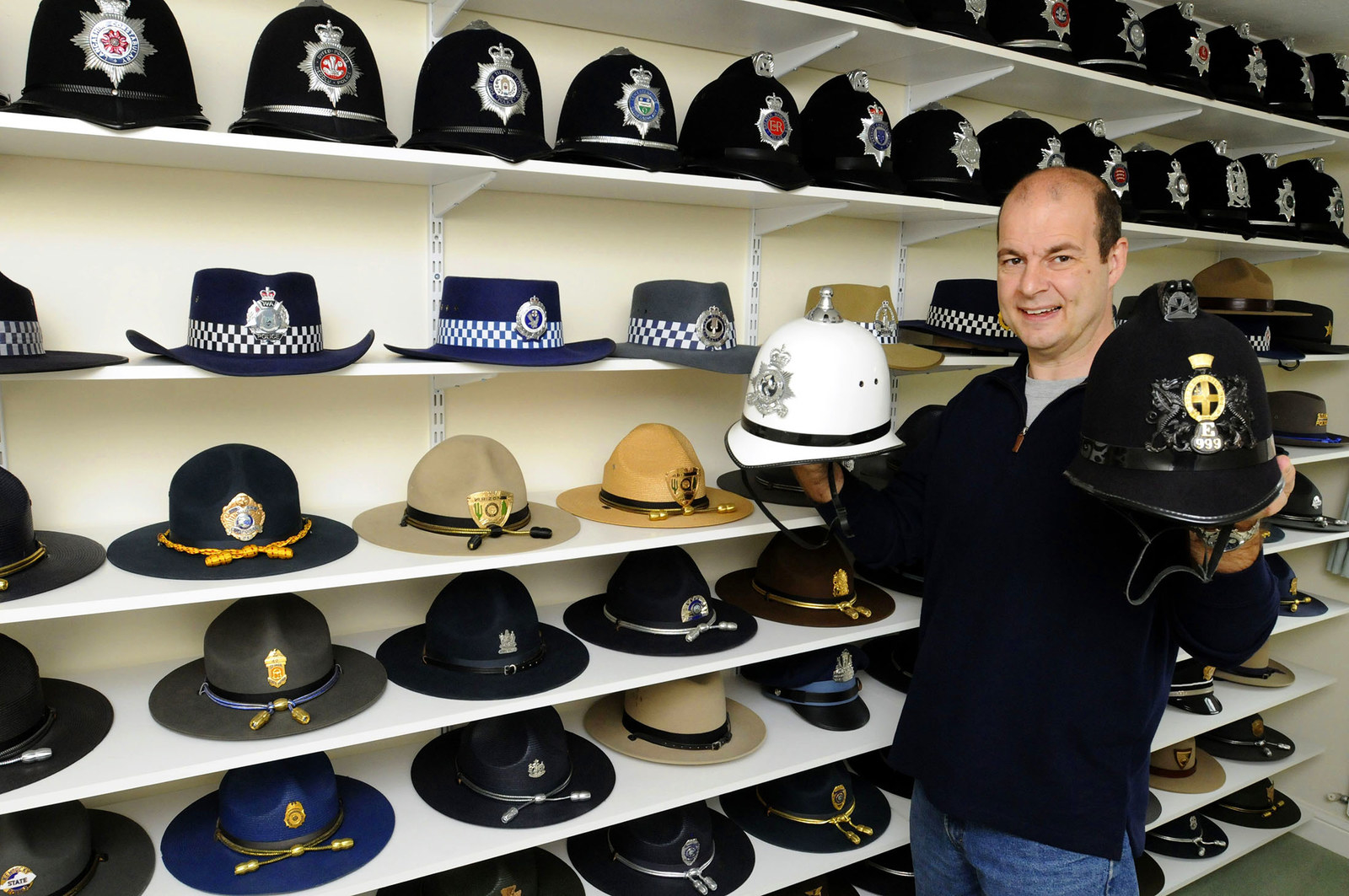 This guy is a cop cap collector.