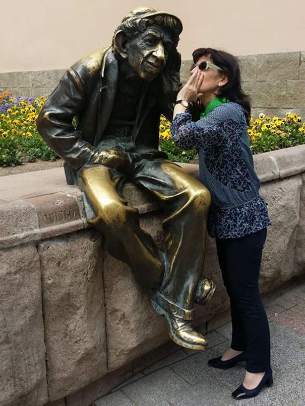 24 people taking statue posing to a new level