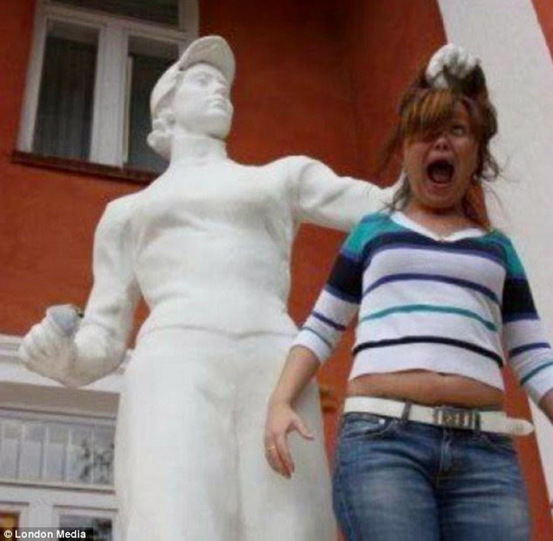 24 people taking statue posing to a new level