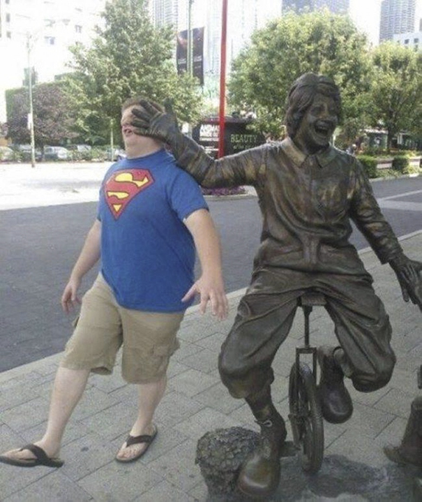 24 people taking statue posing to a new level