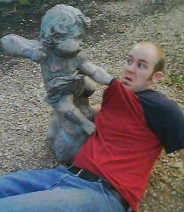 24 people taking statue posing to a new level