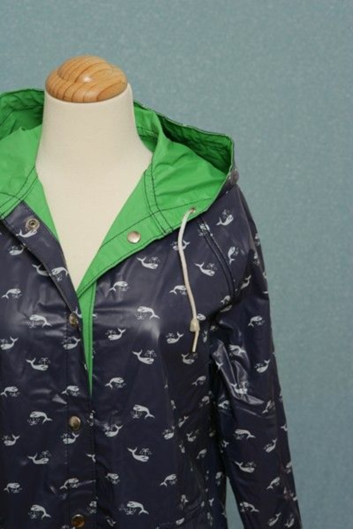 Why did everyone have the whale raincoat? It's anyone's guess really but this made the roungs- they were always navy but the trim varied. Families had matching ones, you were no one without your whale raincoat.