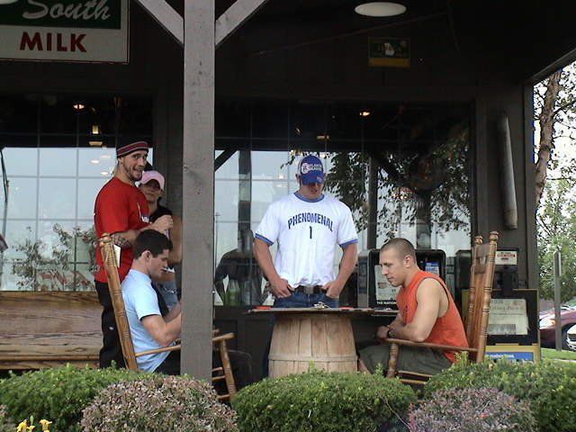 CM Punk, a woman I can’t quite make out, Matt Sydal, AJ Styles, and Daniel Bryan chilling outside a Cracker Barrel. No Cracker Barrels around here in Canada, but I’m told it’s a Cracker Barrel