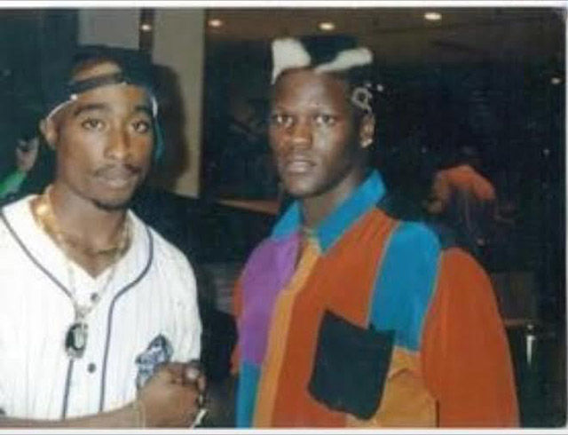 Tupac with an aspiring rap artist, R-Truth. Dat hair doe.