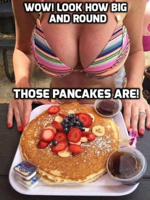 Funny meme of large bosom waitress bringing you the most round pancakes ever, and that is not the only thing that seems perfectly round in the picture.