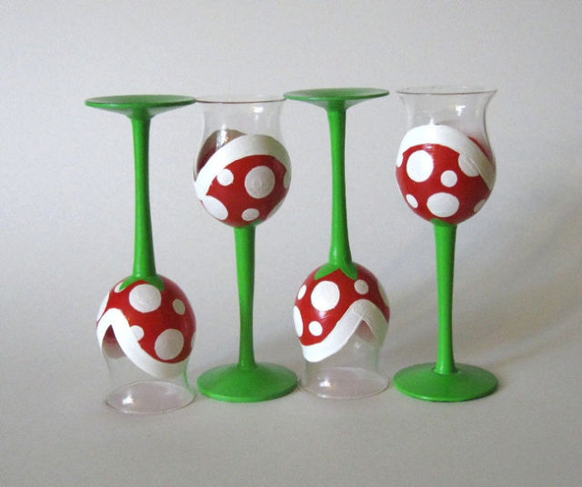 Super Mario Piranha Plant Long-Stemmed Glasses - Get it <a href="https://www.etsy.com/listing/100563390/piranha-plant-wine-glasses-hand-painted" target="_blank">here</a>.