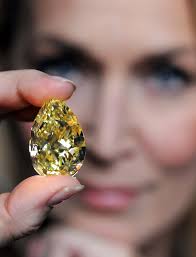 Color of diamond is usually pale yellow to colorless, but can also be brown, blue, green, orange, red, pink and black
