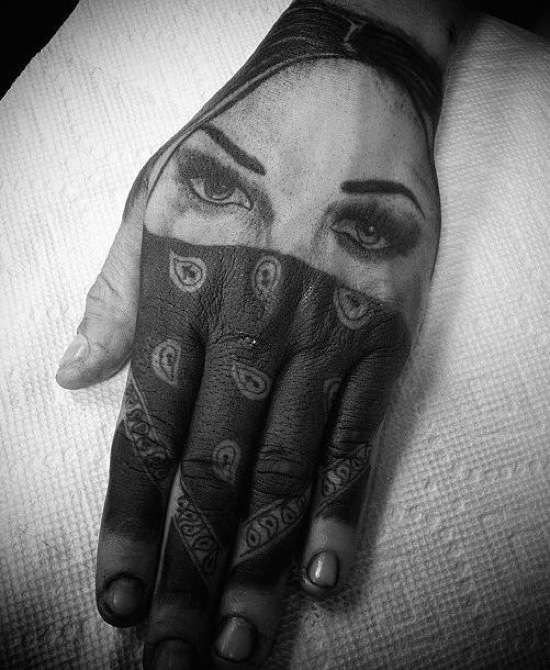 girl with bandana tattoo on hand