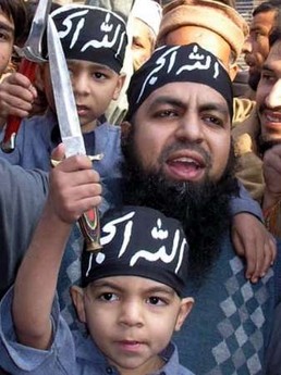 Here we have baby Ahab_Arab with his dad on "bring your child to work day". Unfortunately his father was killed in a suicide vest mishap a few days later.