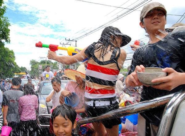 Songkran Festival:
A celebrated that takes place in Thailand as part of the traditional New Year from April 13-15 where people run the streets with pails of water and squirt guns.