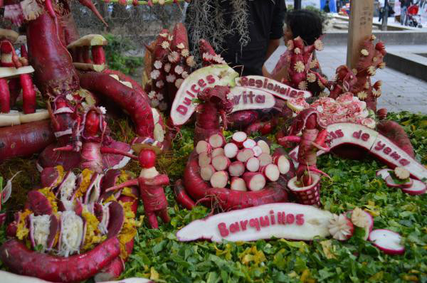 Noche de Rábanos:
The Night of the Radishes takes place annually in Oaxaca, Mexico and begins with a competition where craftsmen carve oversized radishes into vivid forms.