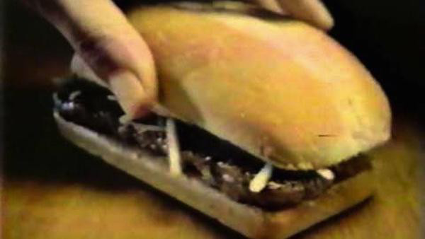 Chopped Beefsteak Sandwich:
They took a burger, elongated it, threw it on a roll with some onions, and served packets of steak sauce with it. The whole campaign self-destructed, taking this sandwich with it.