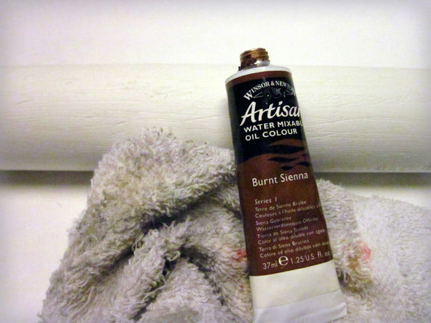 Find a nice oil color you like for your PVC wood. Wipe it on with a rag, making sure to work it into all the new grooves.