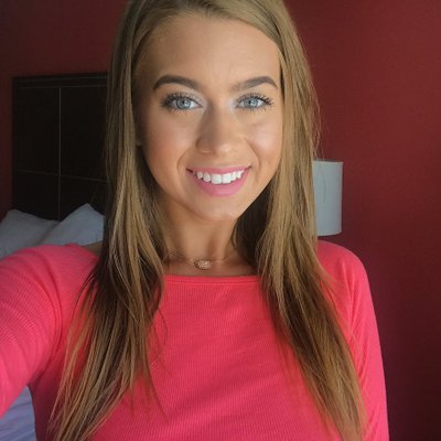 photo of Jill Kassidy in a pink shirt