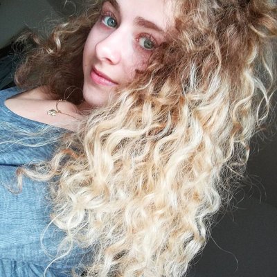 photo of Maryjane Auryn with big curly hair