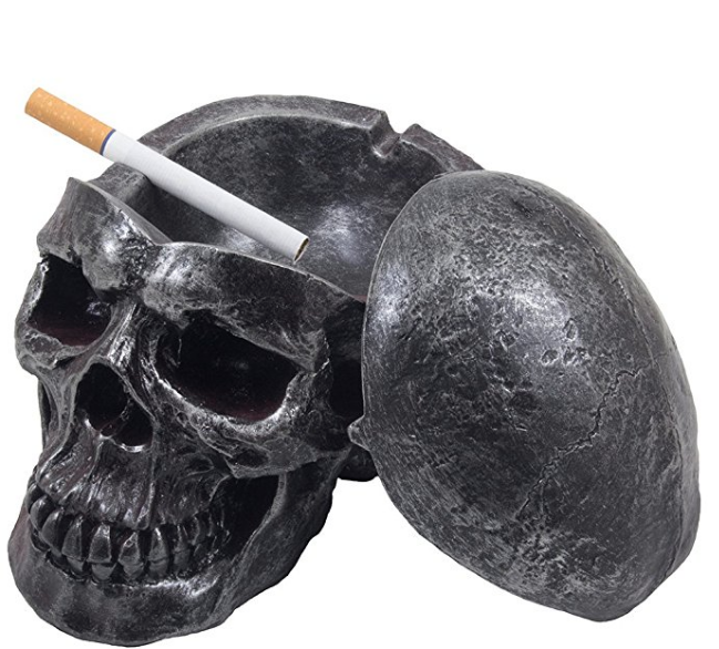 Somethings are meant for Halloween while others are meant for creepy people. This  <a href="https://amzn.to/2pqSwsQ" target="_blank">Skull Ashtray</a> is both. 