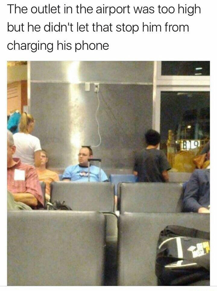 really funny pictures - The outlet in the airport was too high but he didn't let that stop him from charging his phone