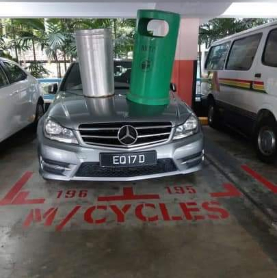 really funny pictures - car park motorcycle lot dustbin - Eo 170 796 MCycles