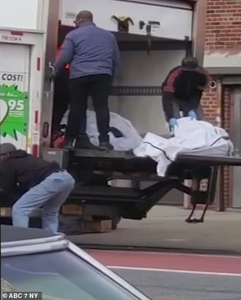loading bodies out of a Uhaul truck in Brooklyn