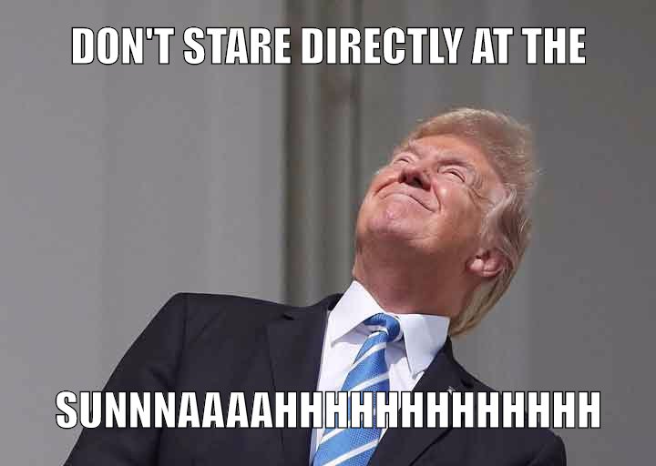 TRUMPT CAUGHT STARING THE THE SUN DURING THE ECLIPSE