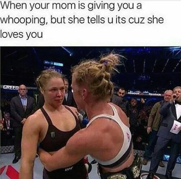 Meme of girl fighters as how it feels when mom is giving you a whooping but tells u its because she loves your.