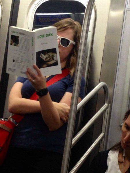 random pic people reading books in public - Love Dick