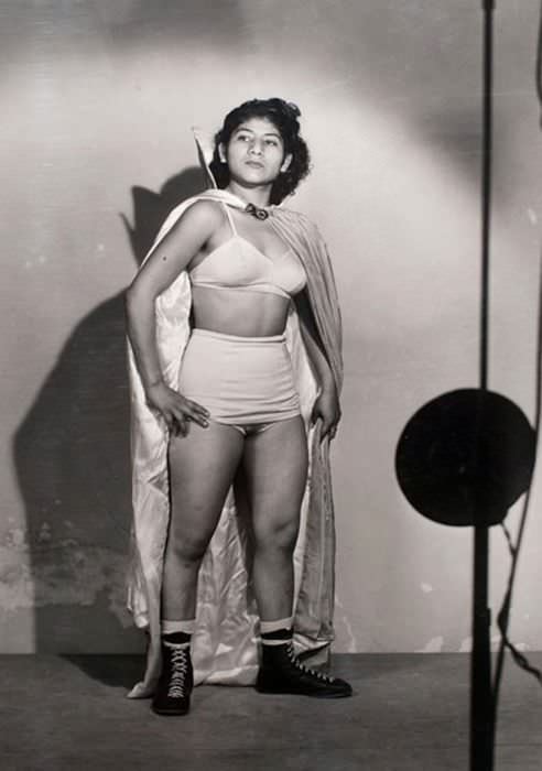 Mexican wrestler Irma Gonzalez posing before one of her first matches in 1955. She became one of the most famous Mexican female Luchadores of all-time.